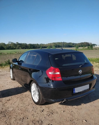 BMW Seria 1 cena 22900 przebieg: 210000, rok produkcji 2009 z Rawicz małe 172